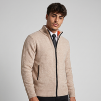 NOLA model wearing zip-up ribbed knit cardigan stand collar