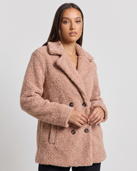 NOLA model wearing teddy double-breasted coat