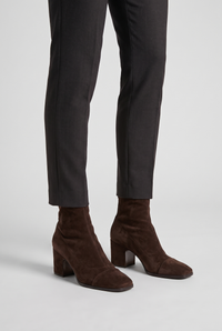 NOLA model wearing suede block heel ankle boots dark brown
