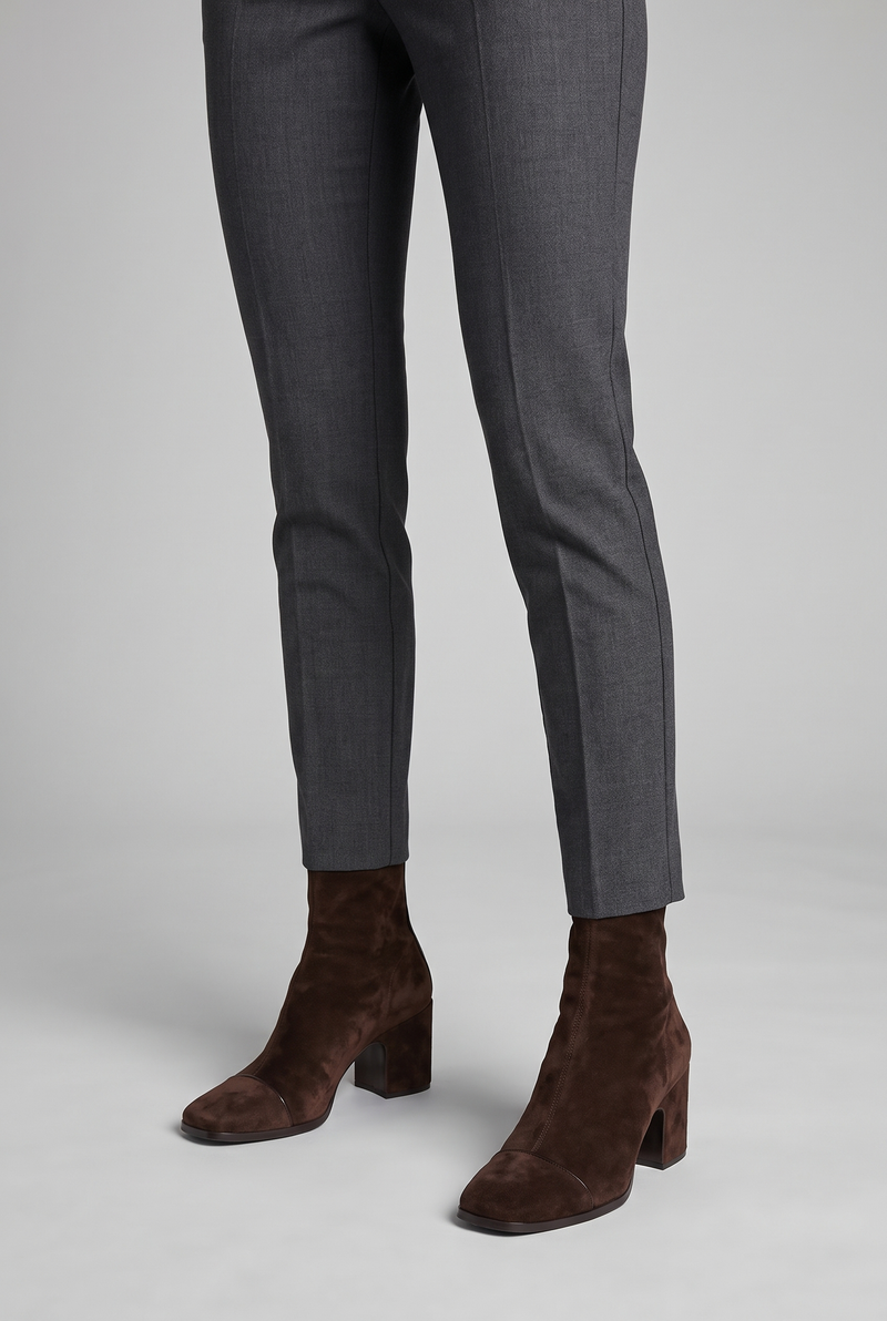 NOLA model wearing suede block heel ankle boots dark brown