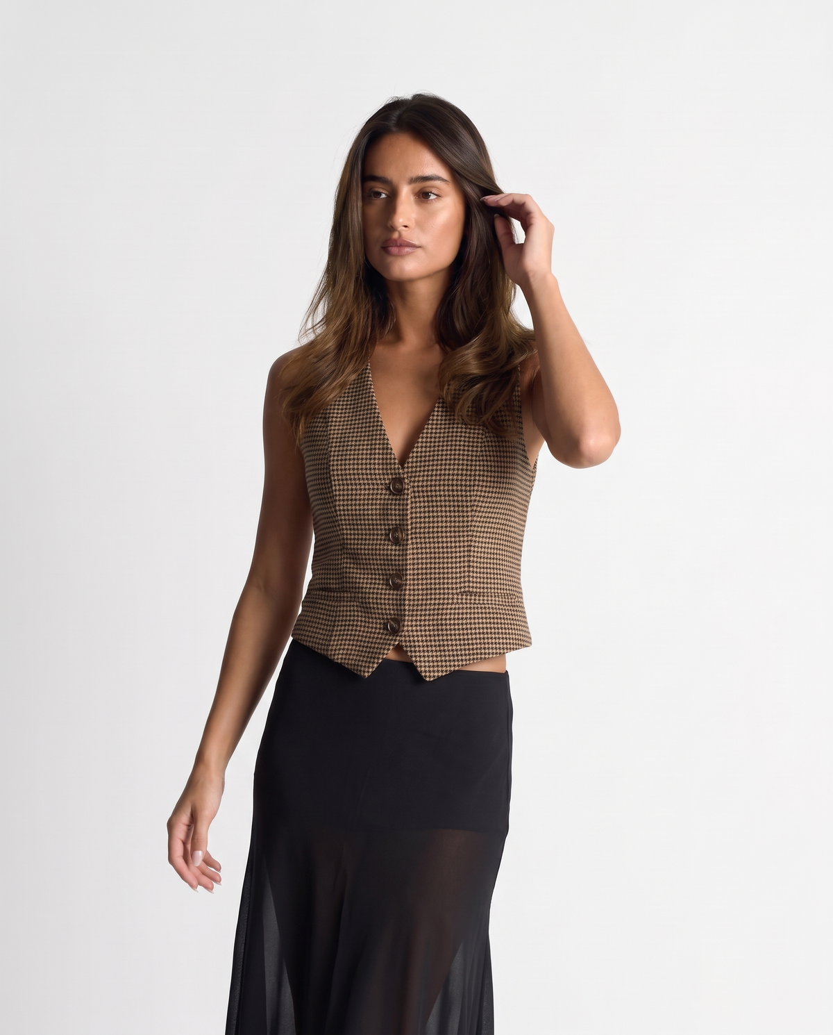 Julia check waistcoat in brown styled with black sheer maxi skirt