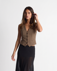 Julia check waistcoat in brown styled with black sheer maxi skirt